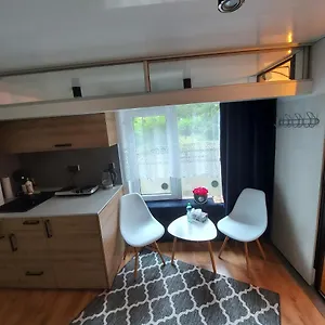https://designerski-mikroapartament.poznan-hotels.com